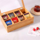 Бамбукова кутия за чай с 8 отделения и стъклен капак Бамбукова кутия за чай с 8 отделения и стъклен капак